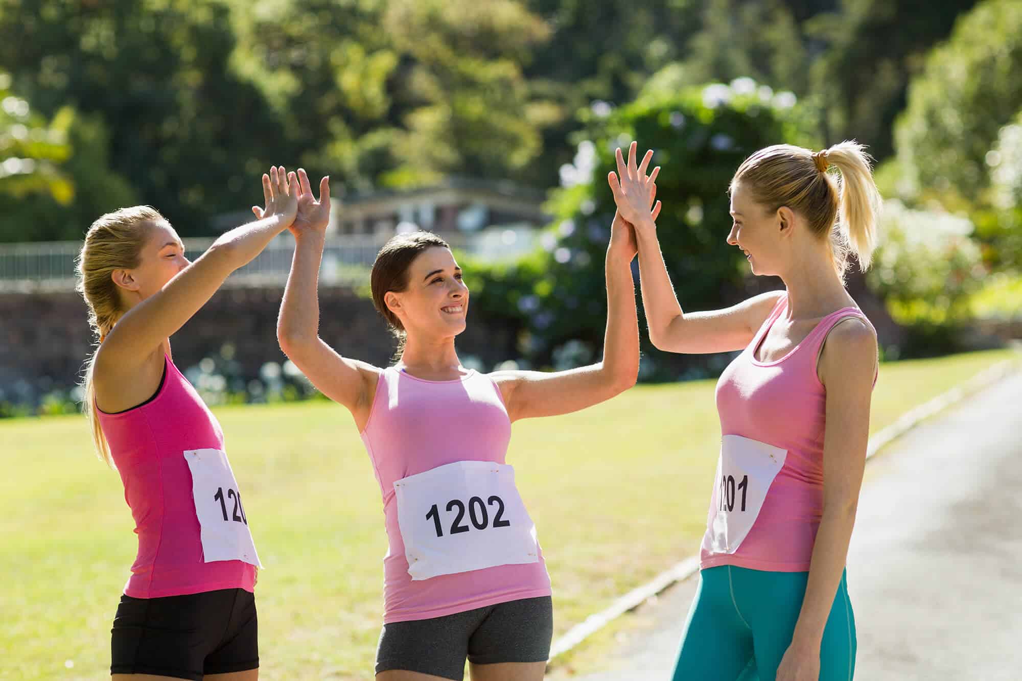 female-athletes-giving-high-five-to-each-other-2023-11-27-04-56-40-utc.jpg